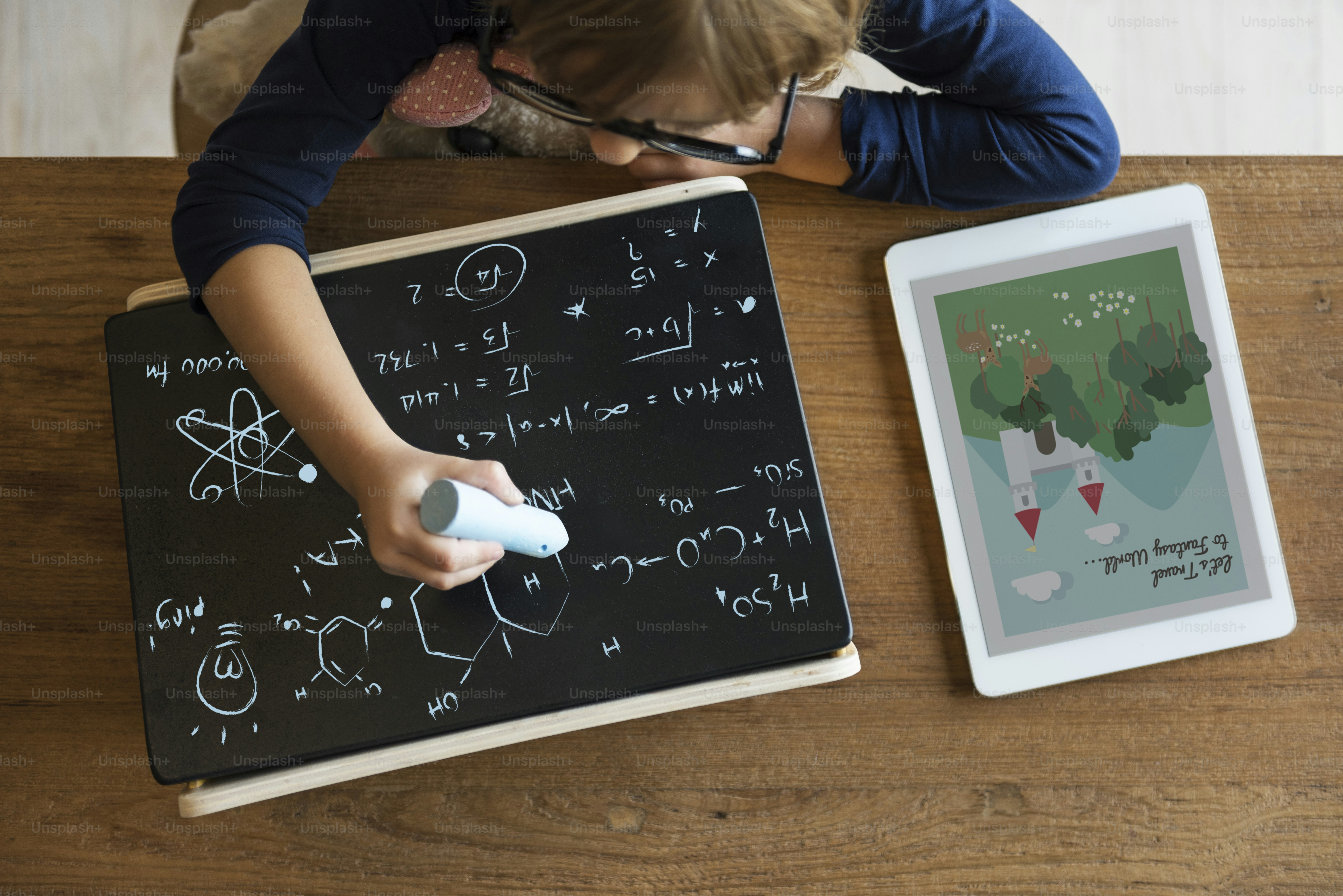Little Girl Writing Blackboard Concept